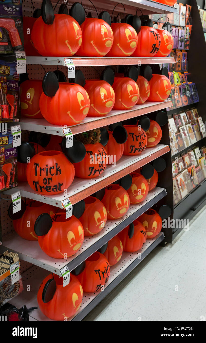 Halloween plastic pumpkins or jack-o' lanterns with mouse ears for sale in store in tNew York City in the USA Stock Photo