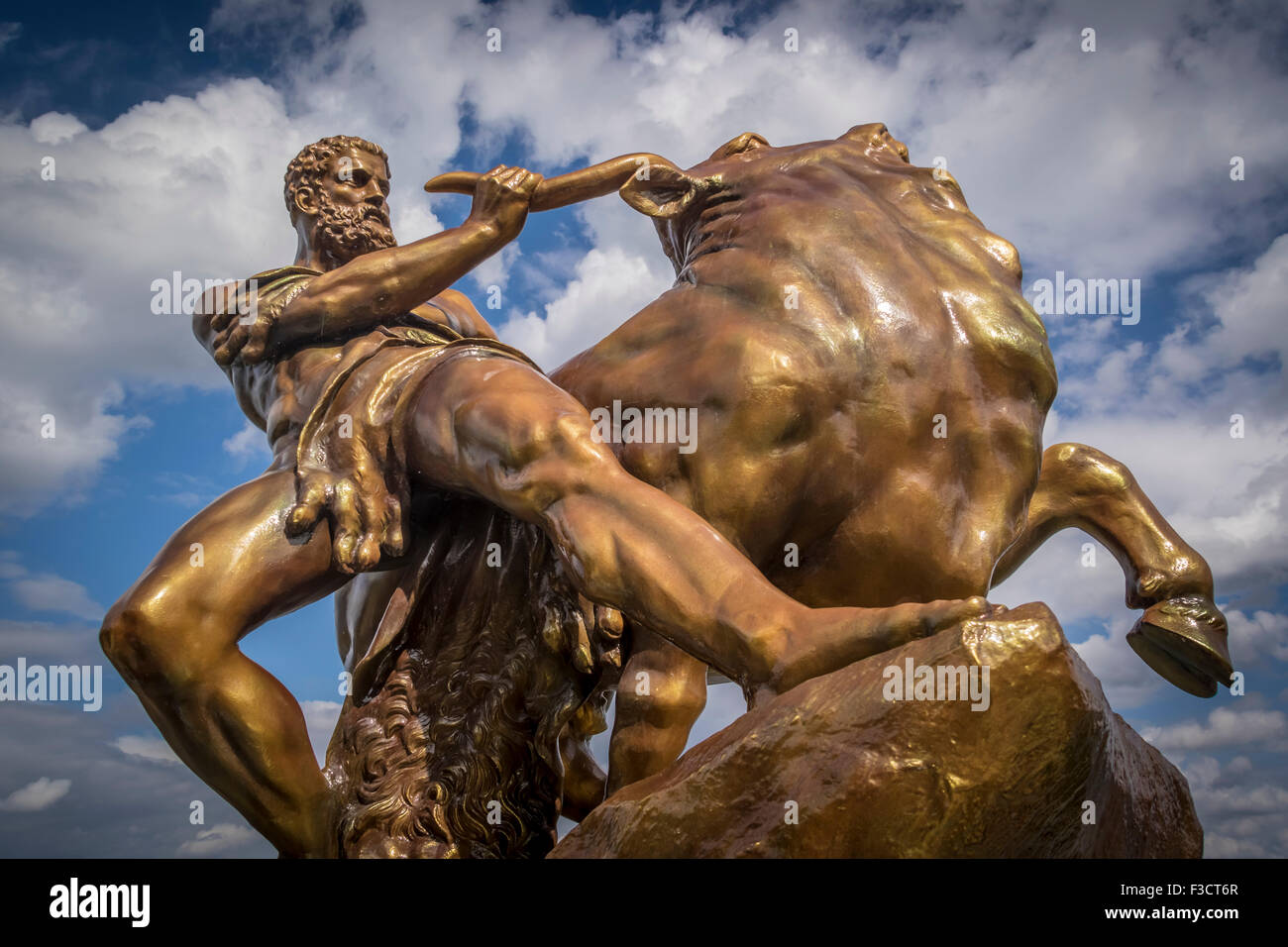 Bronze statue of Hercules wrestling a bull in the grounds of Schwerin