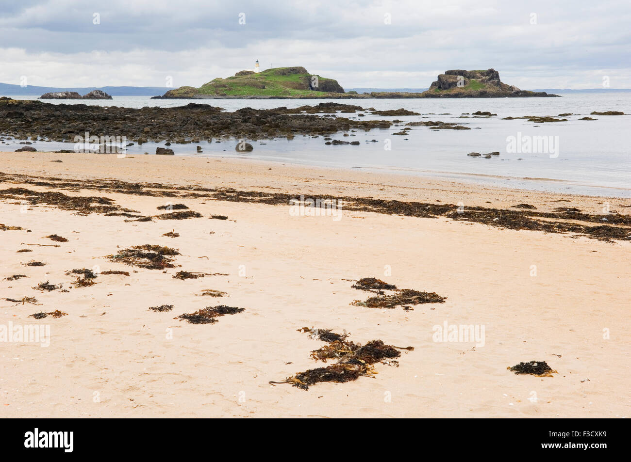 Yellowcraigs beach looking out to Fidra island and lighthouse, East Lothian, Scotland. Stock Photo