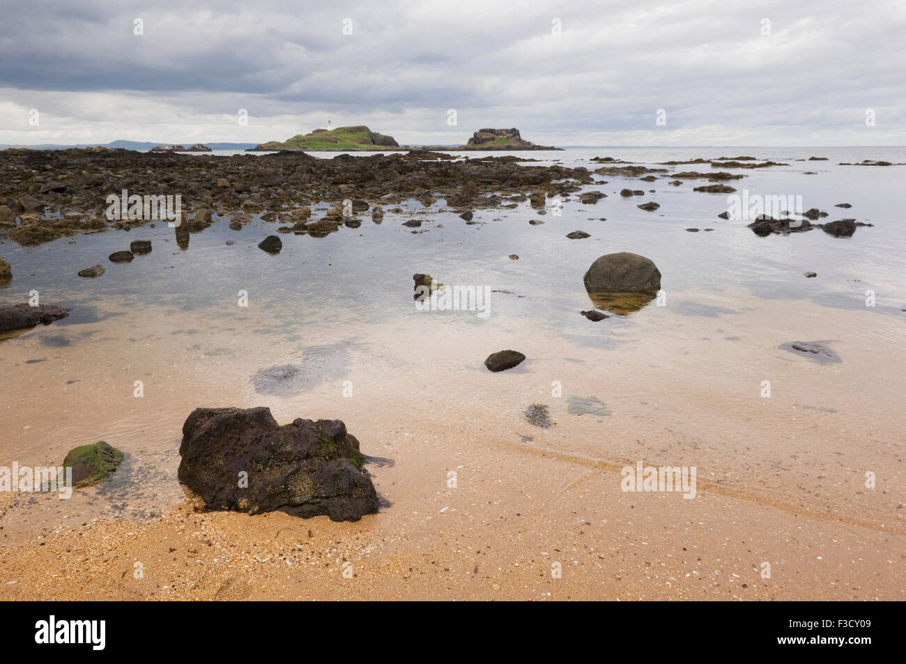 Yellowcraigs beach looking out to Fidra island and lighthouse, East Lothian, Scotland. Stock Photo