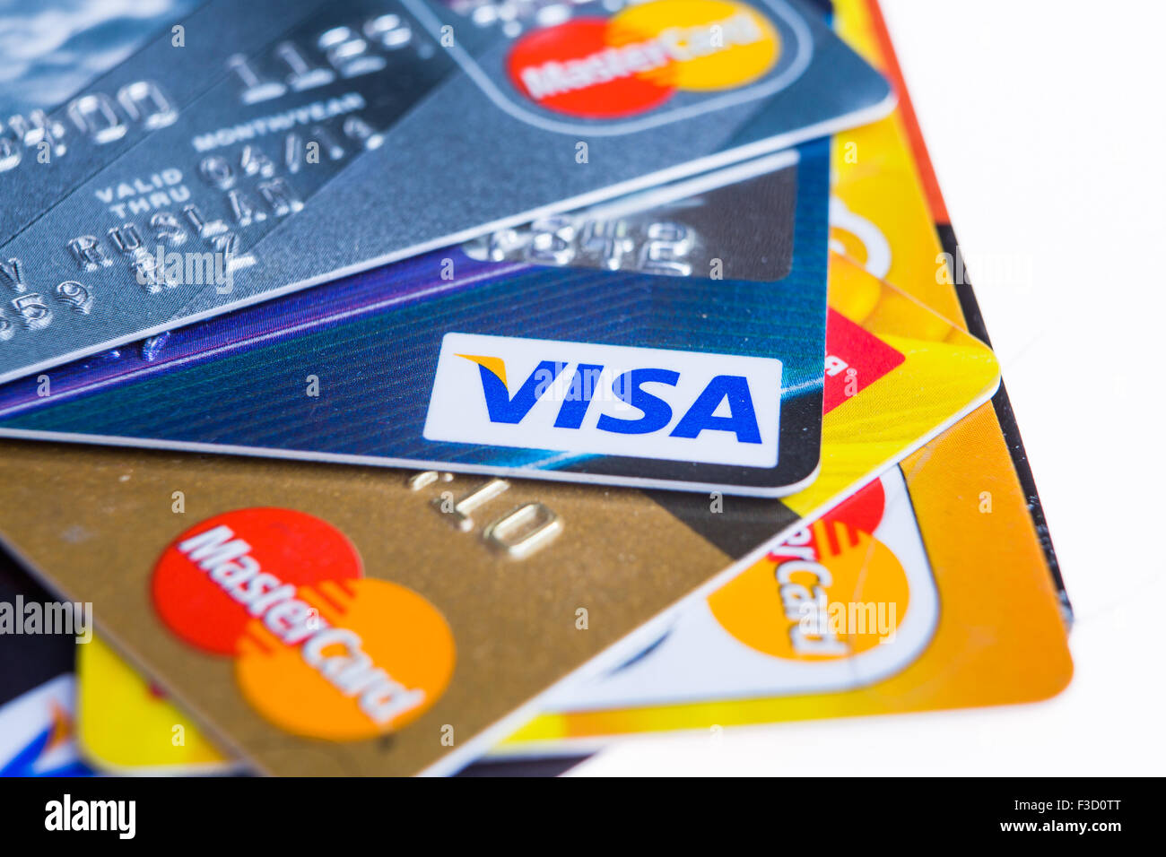 Samara, Russia- 3 February 2015: Closeup studio shot of credit cards issued by the three major brands American Express, VISA and Stock Photo