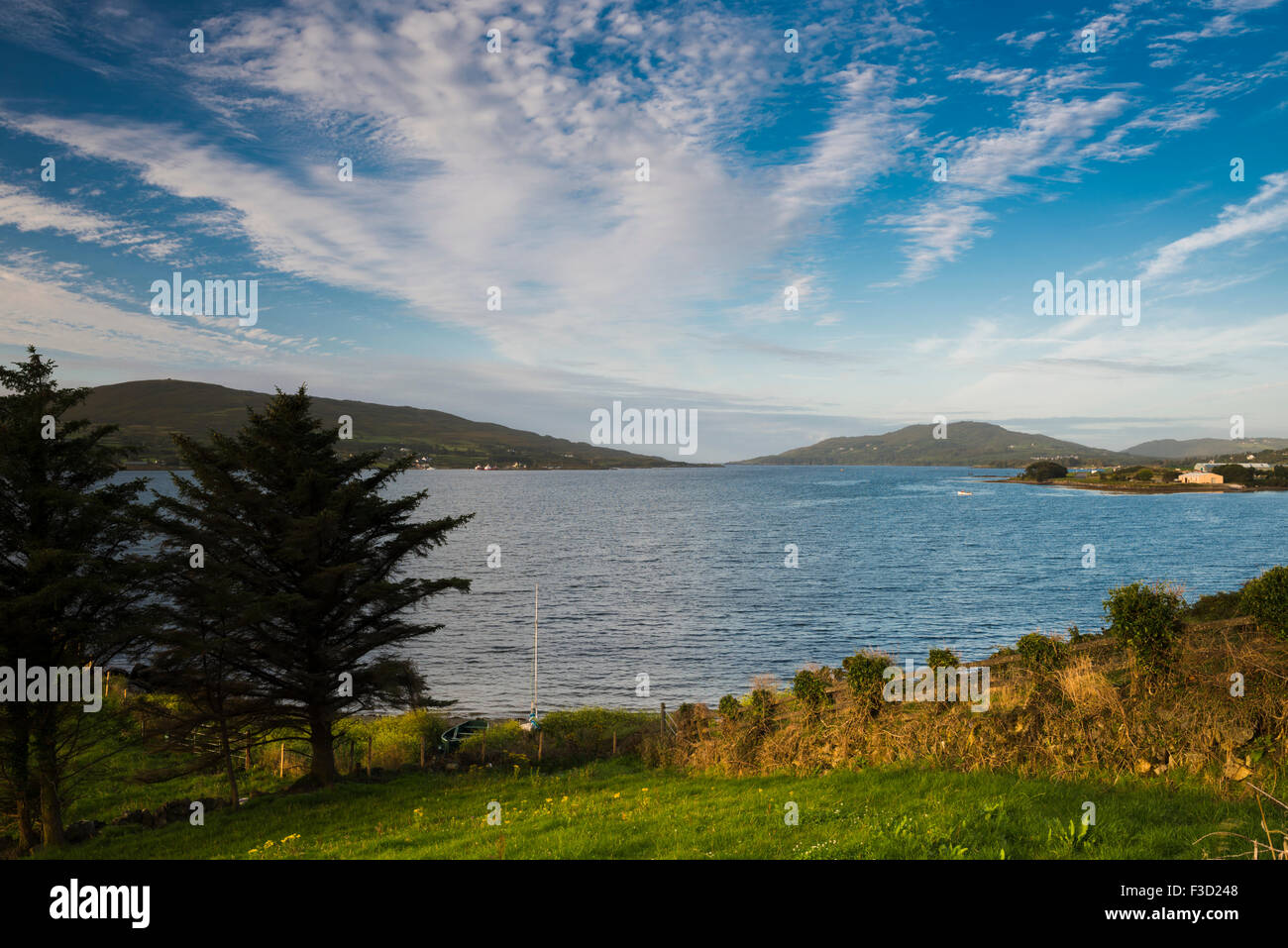 View westward towards the mouth of Bantry Bay between the mainland and Bere Island from Castletownbere, Beara, County Cork Stock Photo