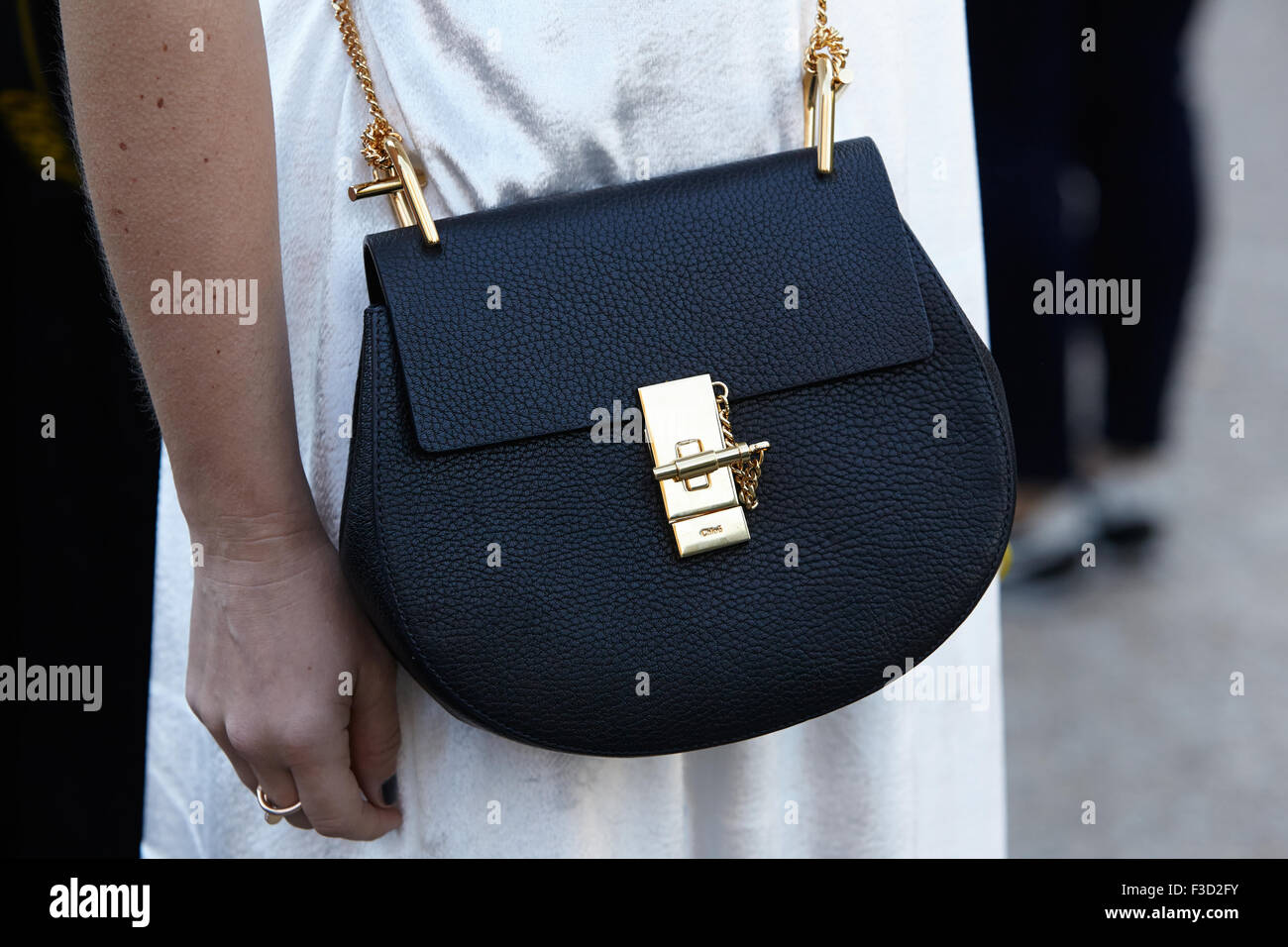 Black Chloe bag before Chloe show, Paris Fashion Week Day 3, Spring /  Summer 2016 street style Stock Photo - Alamy