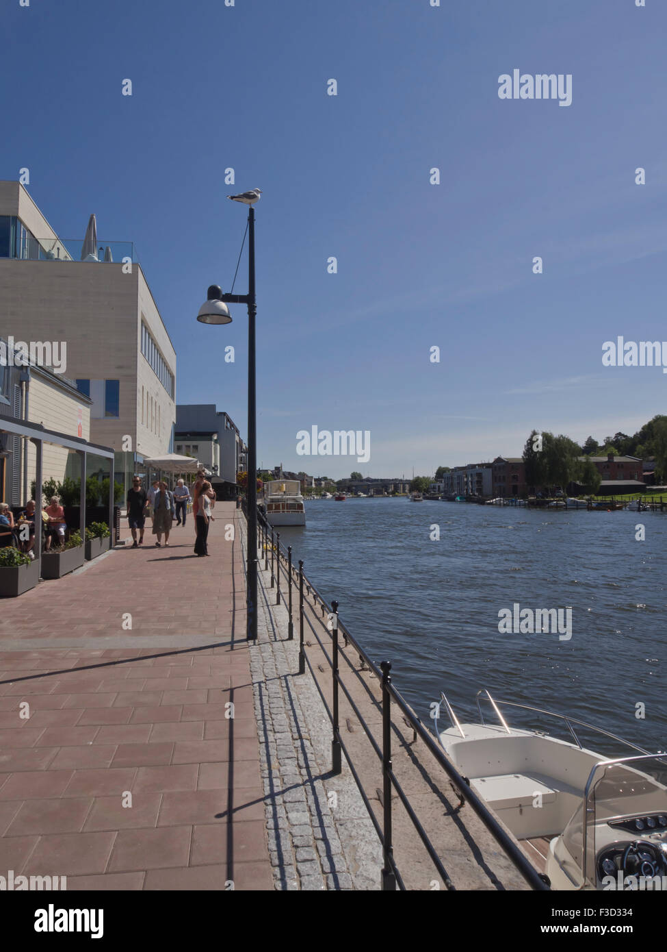 A summer promenade along the harbour in the center of Fredrikstad Norway Stock Photo