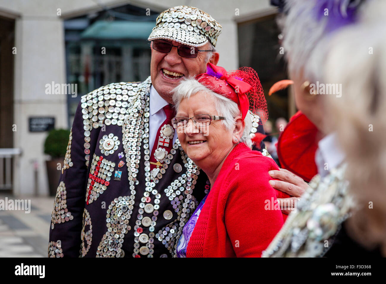 A Pearly King Poses For A Photograph At The Annual Pearly Kings and Queens Harvest Festival Held At The Guildhall, London, UK Stock Photo