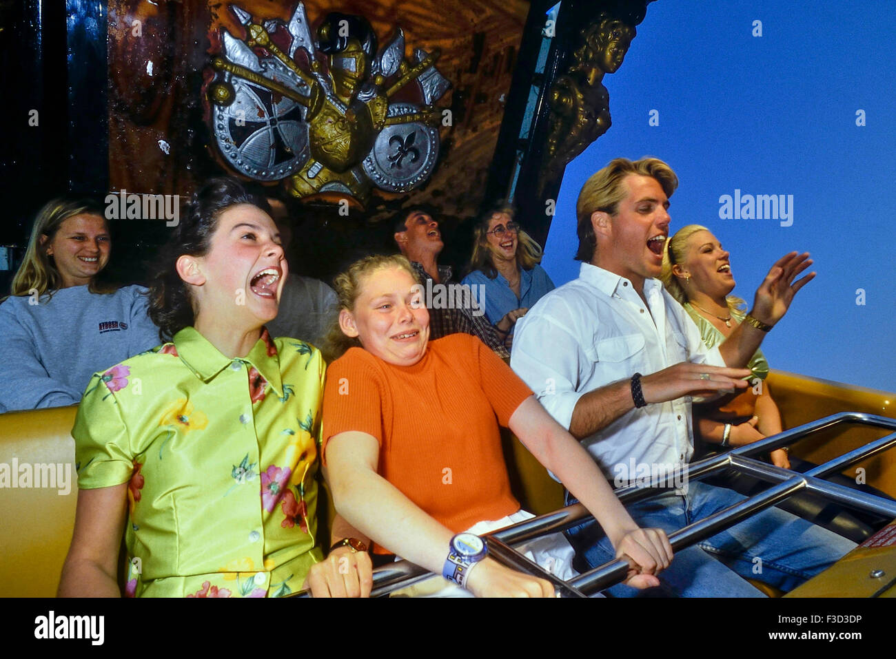 Young people on a fairground ride at Bottom' Pleasure Beach. Skegness. England. UK Stock Photo