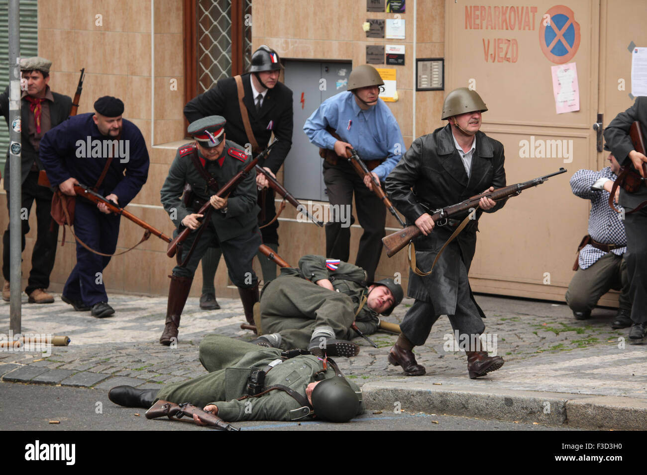 Reenactors dressed as the Czech insurgents attend the reenactment of the 1945 Prague uprising in Prague, Czech Republic, on May 9, 2015. Stock Photo
