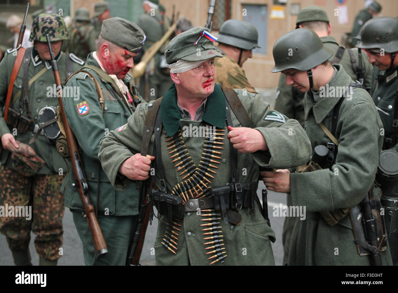 Reenactors uniformed as soldiers of the Russian Liberation Army (ROA)  attend the reenactment of the 1945 Prague uprising in Prague, Czech  Republic, on May 9, 2015. The Russian Liberation Army also known
