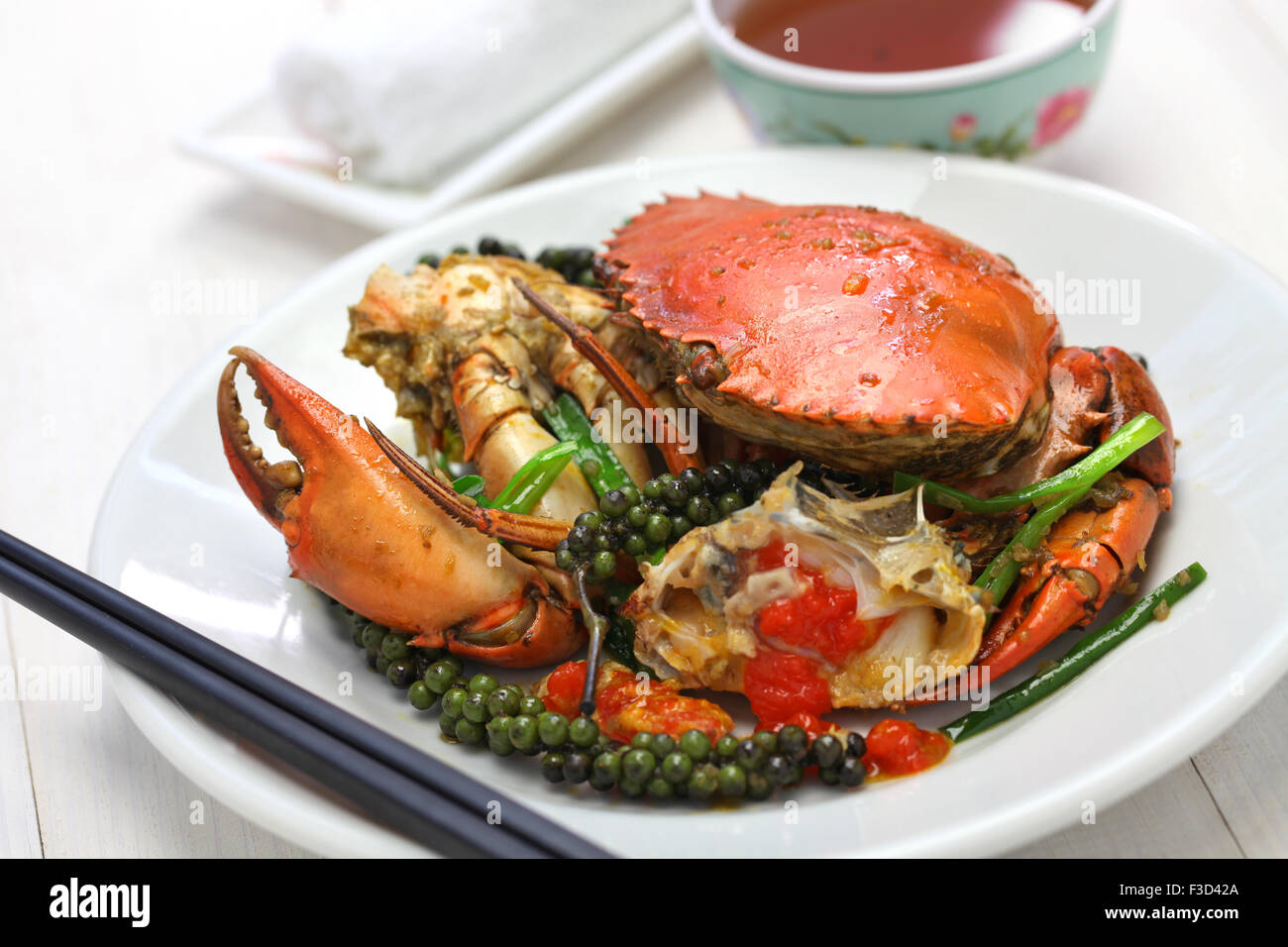 stir-fried crab with green kampot pepper, cambodian cuisine isolated on