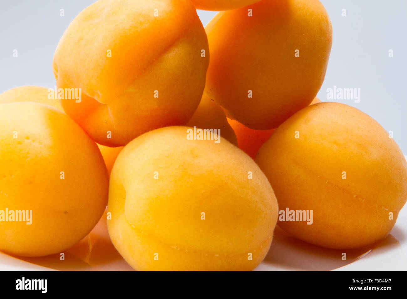 Apricot fruits with leaves isolated on white background Stock Photo Alamy