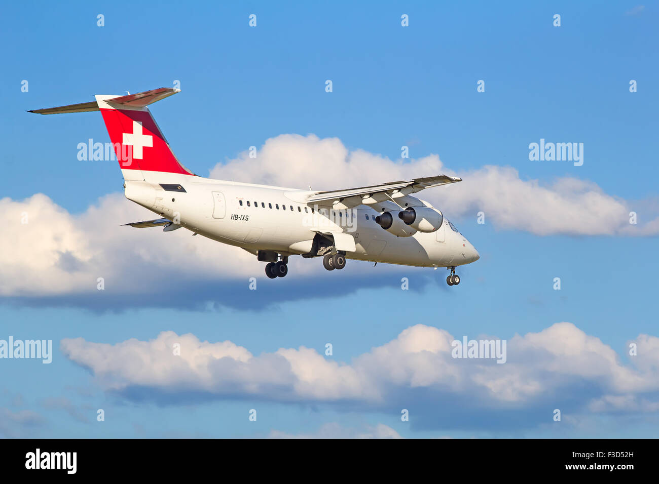 ZURICH - JULY 18: AVRO RJ100 landing in Zurich airport after short haul flight on July 18, 2015 in Zurich, Switzerland. Zurich a Stock Photo