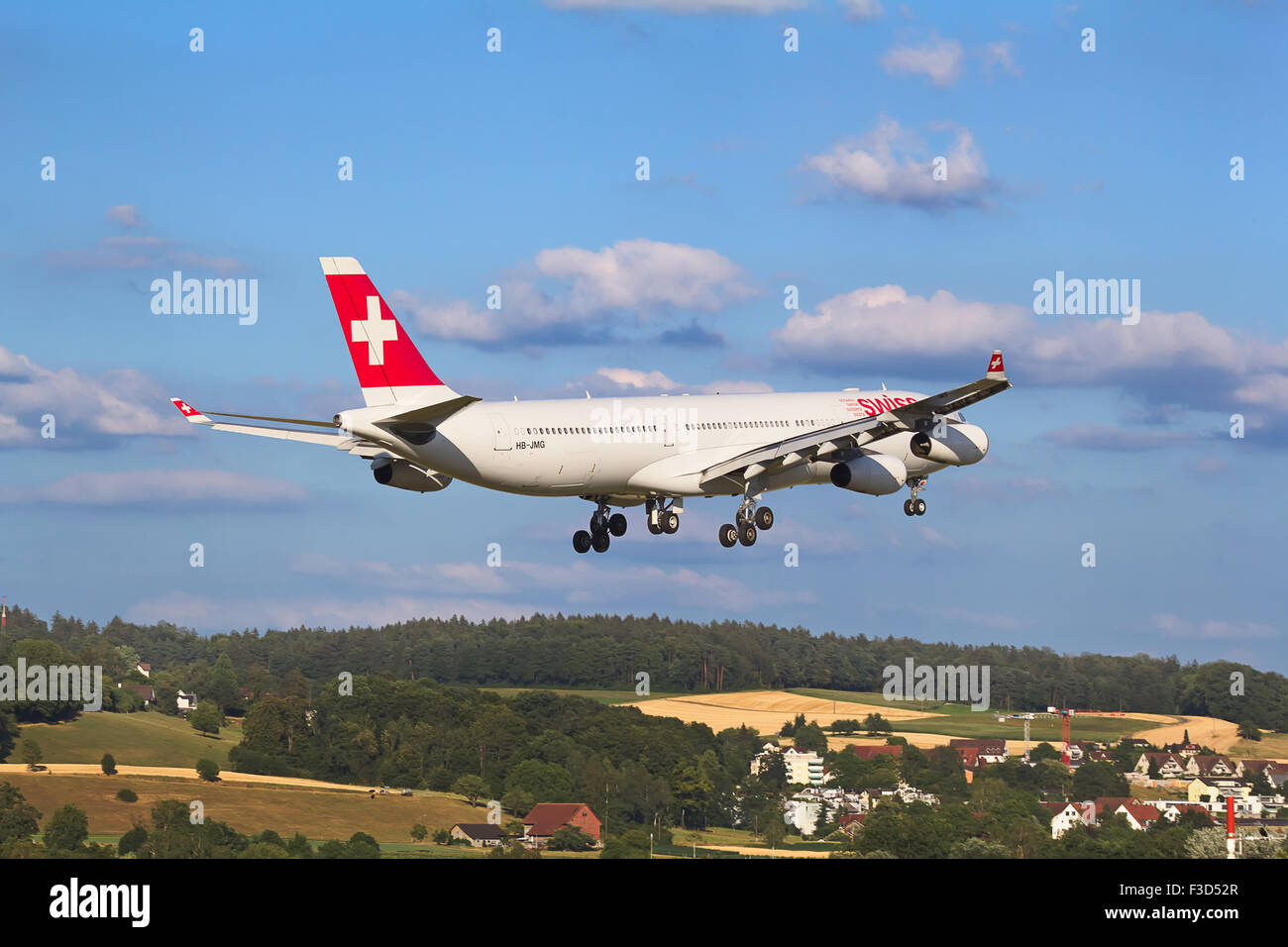 ZURICH - JULY 18: Airbus A-330 landing in Zurich airport after short haul flight on July 18, 2015 in Zurich, Switzerland. Zurich Stock Photo