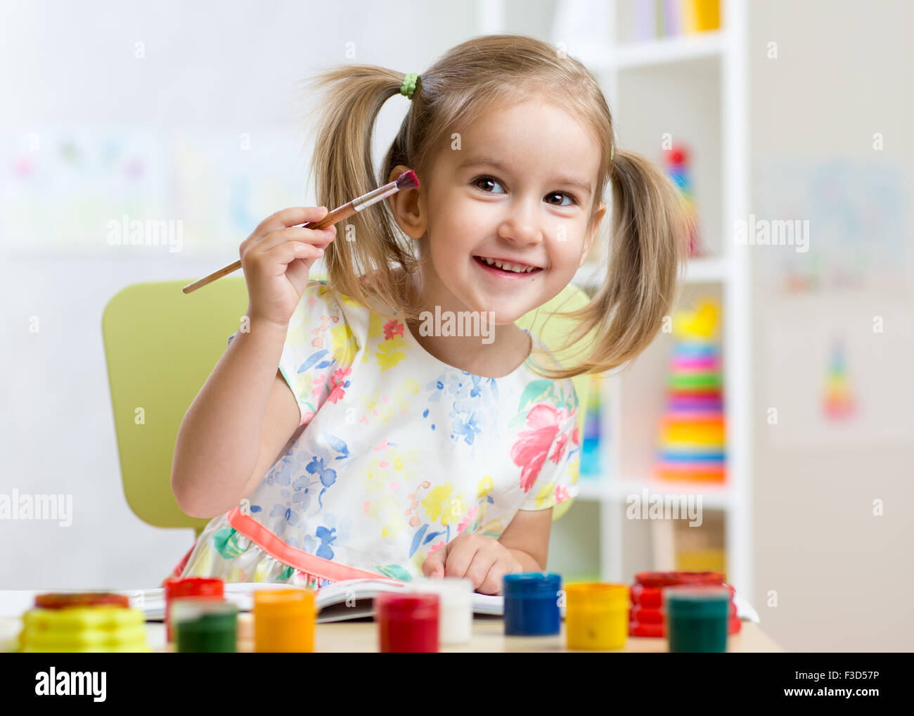 kid painting at home Stock Photo Alamy