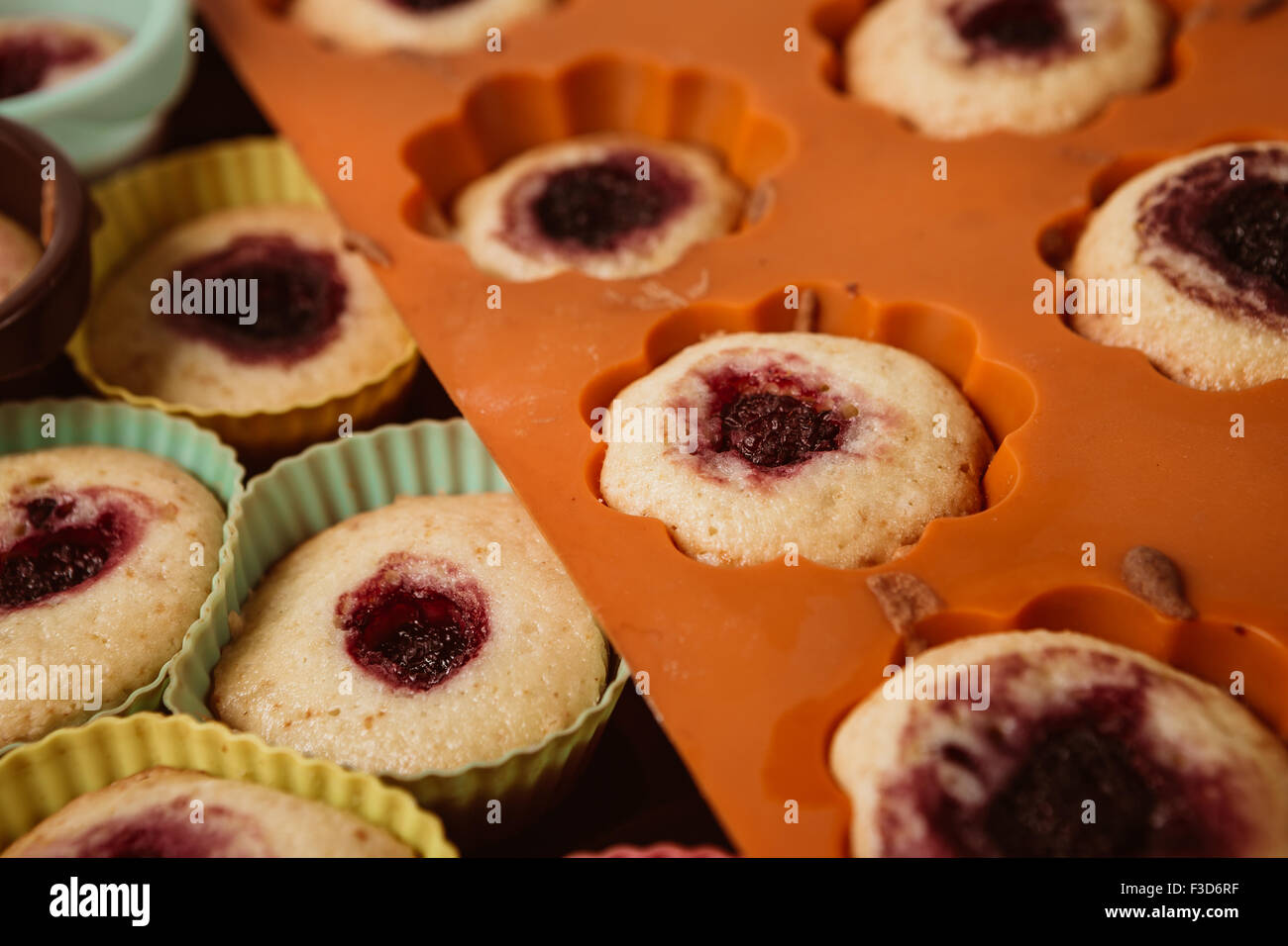 Muffins with  blackberry wood background Stock Photo