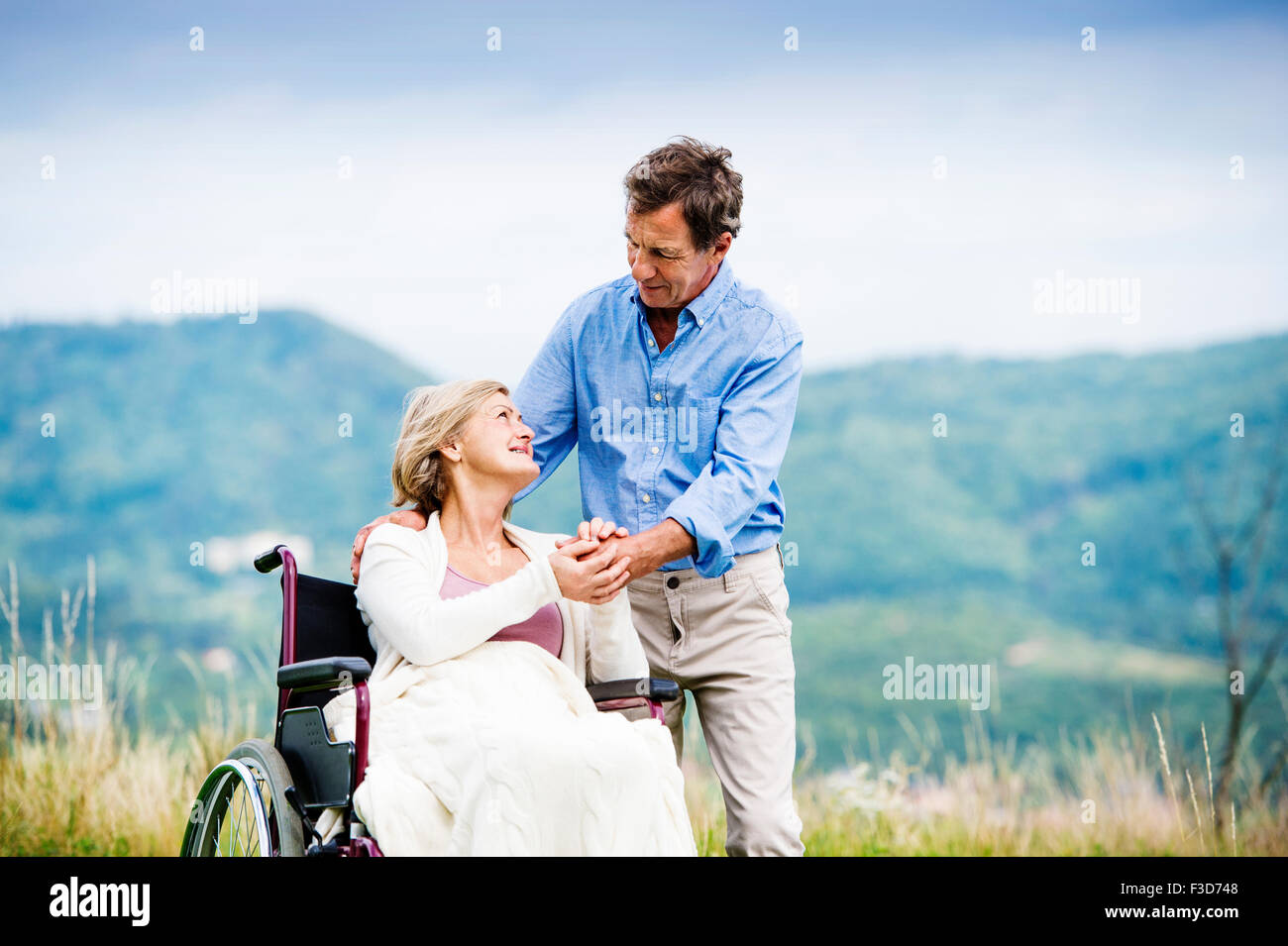 Wheelchair man woman hi-res stock photography and images - Alamy