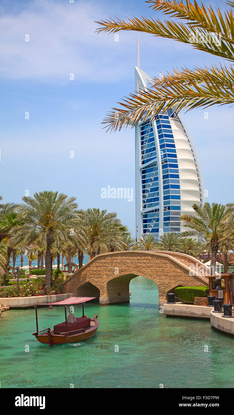 DUBAI, UAE - APRIL 18: View of the hotel Burj Al Arab from Souk Madinat Jumeirah. April 18, 2014 in Dubai. Madinat Jumeirah is l Stock Photo