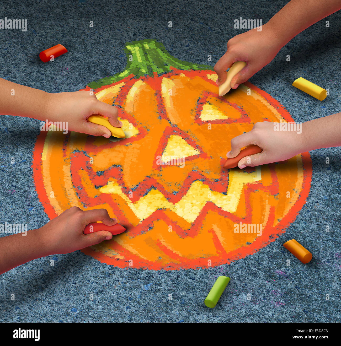 Halloween children drawing a jack o lantern pumpkin with chalk on the outdoor pavement as festive autumn season symbol for community participation in fun activities. Stock Photo