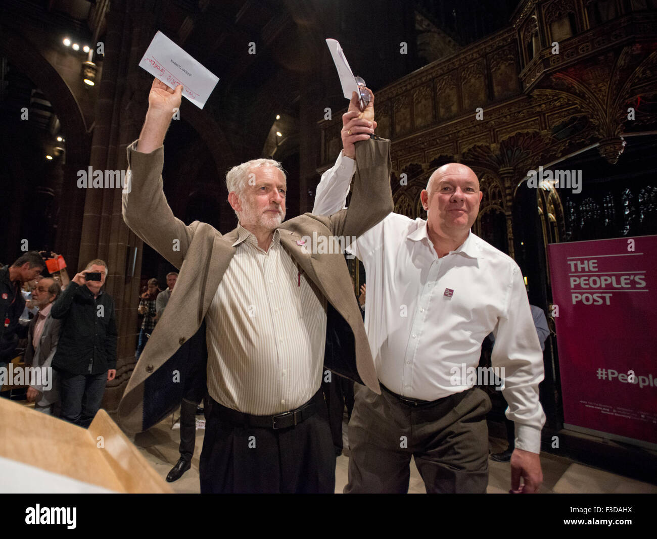 Manchester, UK. 5th October 2015. Dave Ward, General Secretary of the Communication Workers Union (CWU) (right), greets Labour Party leader Jeremy Corbyn before Corbyn spoke at the People's Post Rally event at Manchester Cathedral. Credit:  Russell Hart/Alamy Live News. Stock Photo