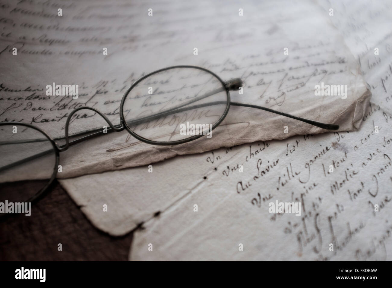 Antique eyeglasses and letters Stock Photo