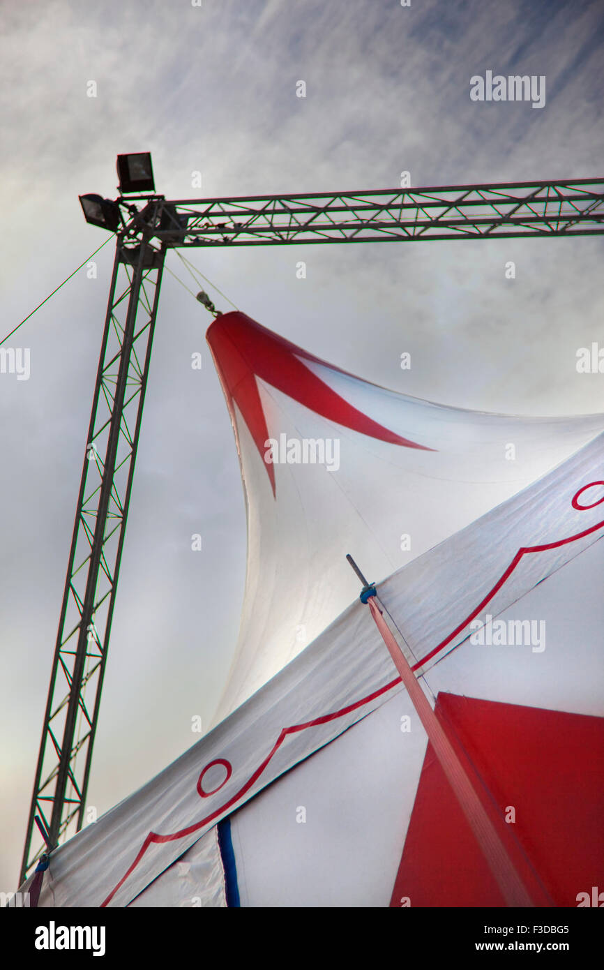 Canvas of a circus tent and cloudy sky Stock Photo - Alamy