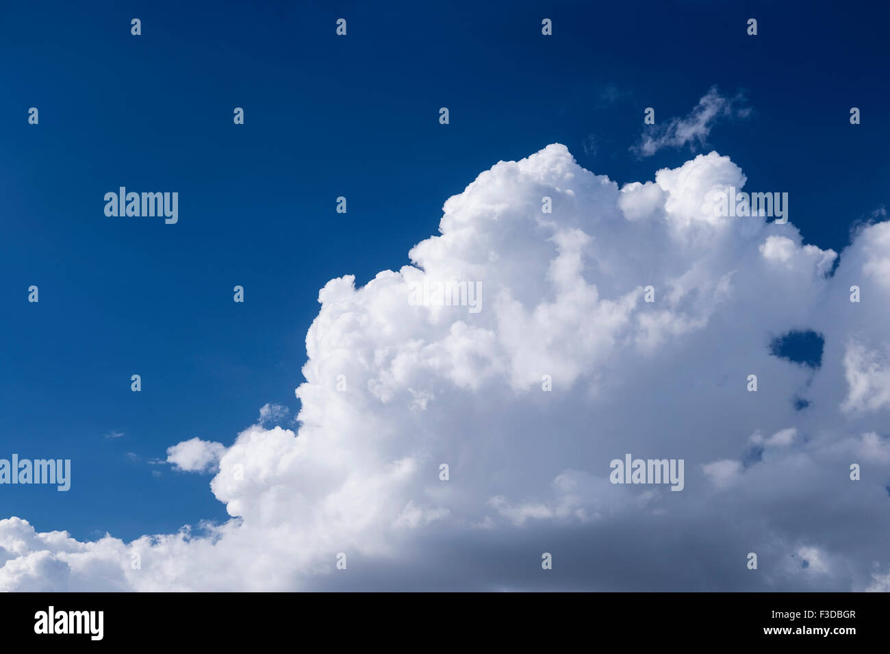 View of puffy cloud formations Stock Photo