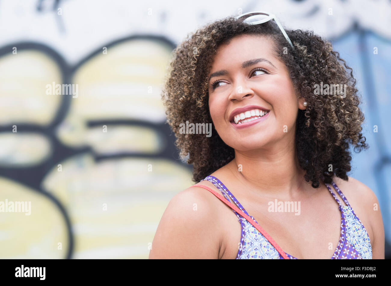 Curly hair woman smiling hi-res stock photography and images - Alamy
