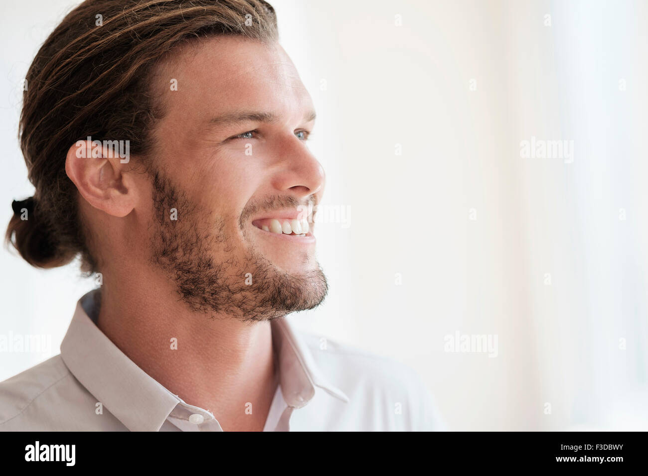 Mid-adult man laughing Stock Photo
