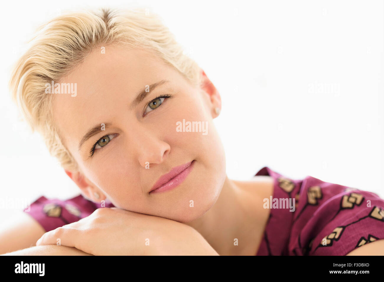 Portrait of young woman on white background Stock Photo