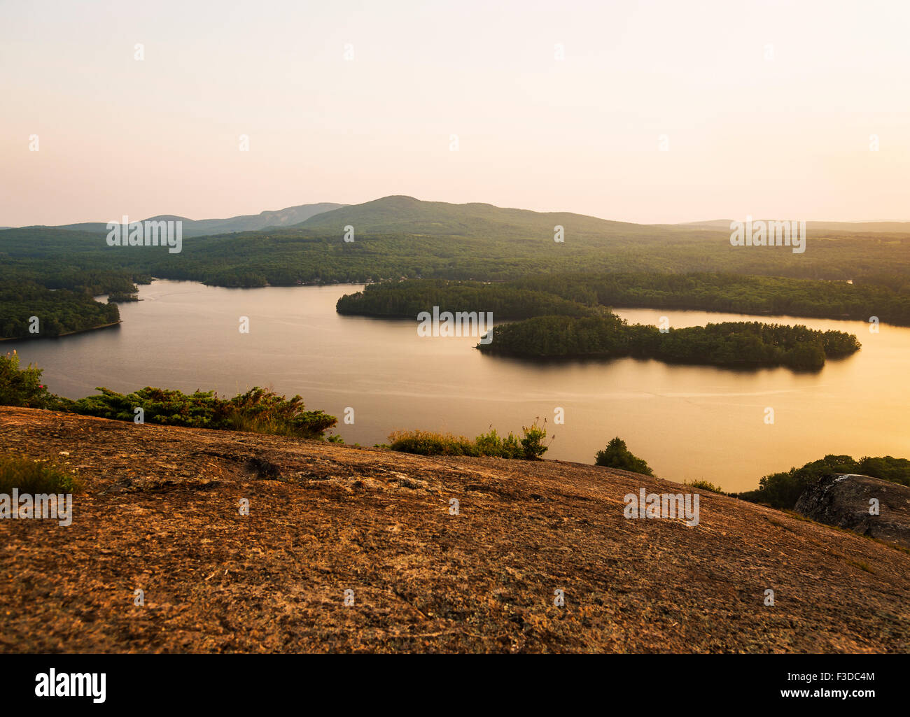 Landscape with lake at sunset Stock Photo - Alamy