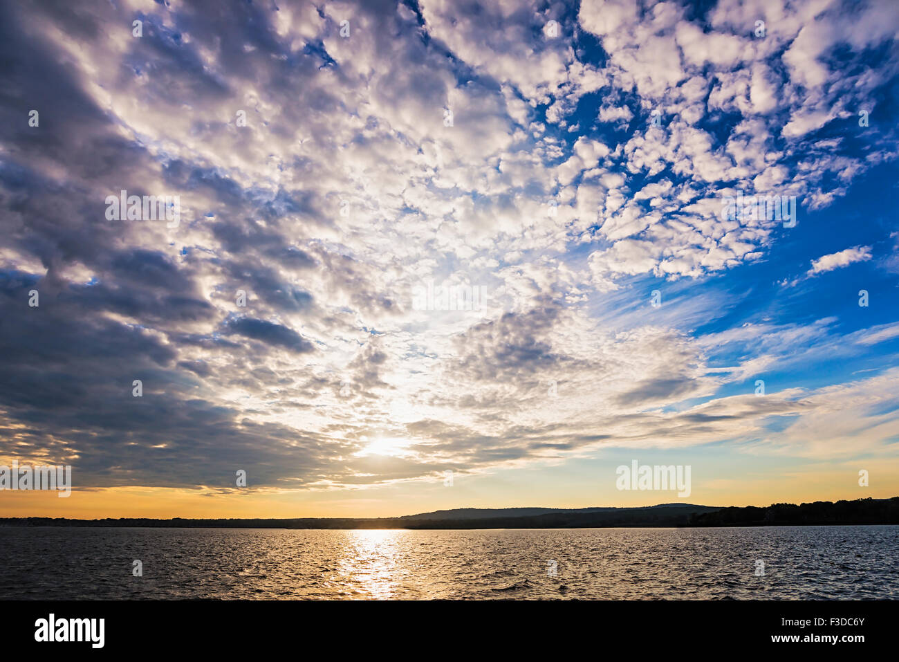 Photo inspiration: Gallery Detail: Cloudy Sky Above Bay At Sunset Stock Photo