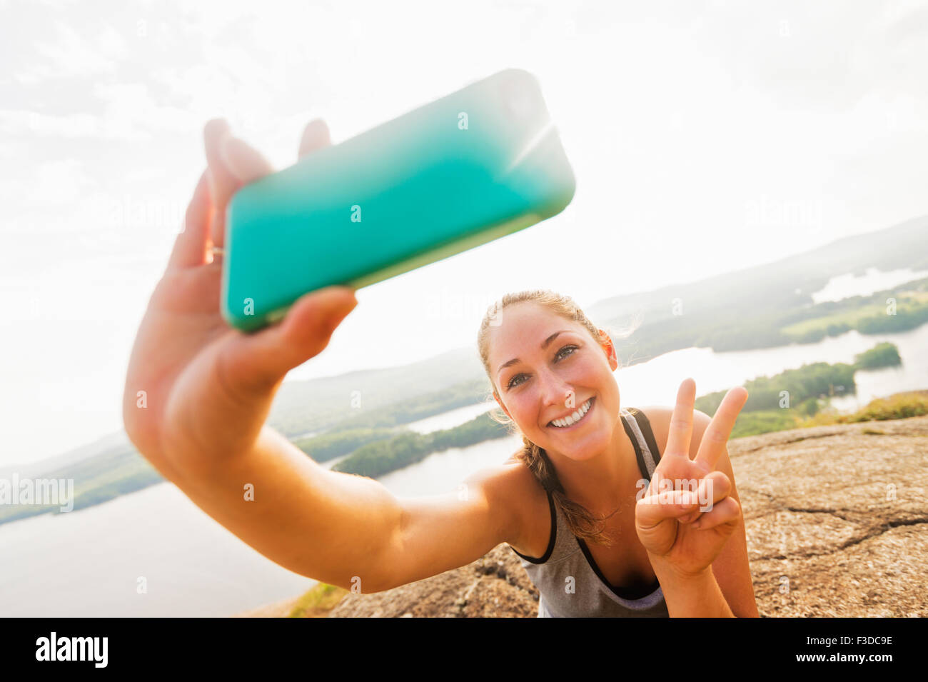 Young woman taking selfie on Smartphone Stock Photo