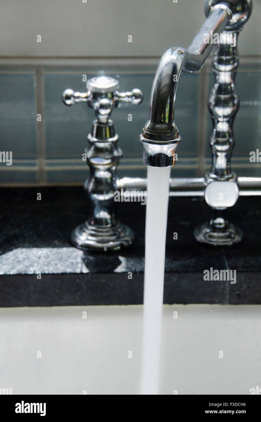 Water running from tap Stock Photo Alamy