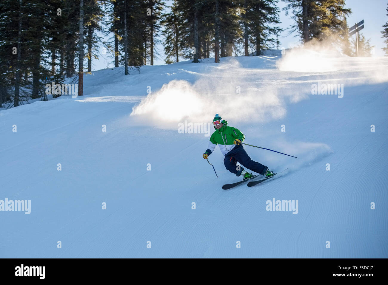Man skiing downhill Stock Photo
