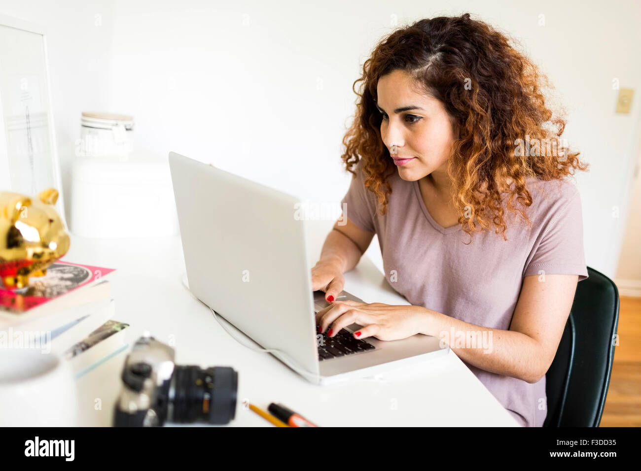 Person using laptop hi-res stock photography and images - Alamy