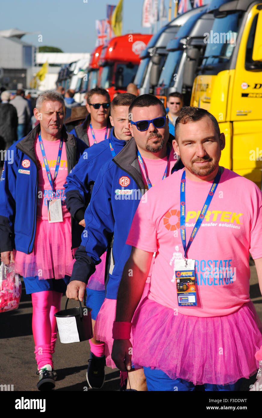 Prostate cancer charity workers collecting money at Silverstone Stock Photo
