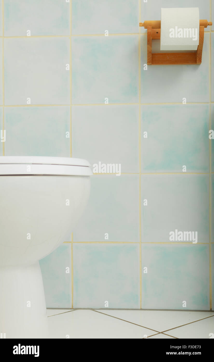 White toilet bowl in modern bathroom closeup Stock Photo - Alamy