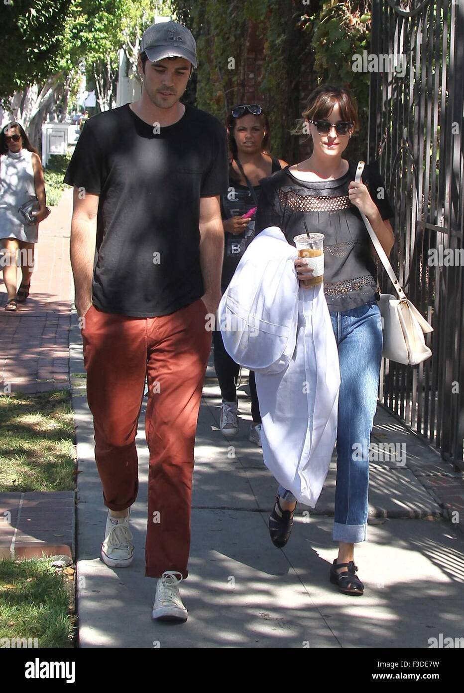 Fifty Shades of Grey' star Dakota Johnson, out and about in turn up jeans  and carrying a drink Featuring: Dakota Johnson Where: Los Angeles When: 04  Aug 2015 Stock Photo - Alamy