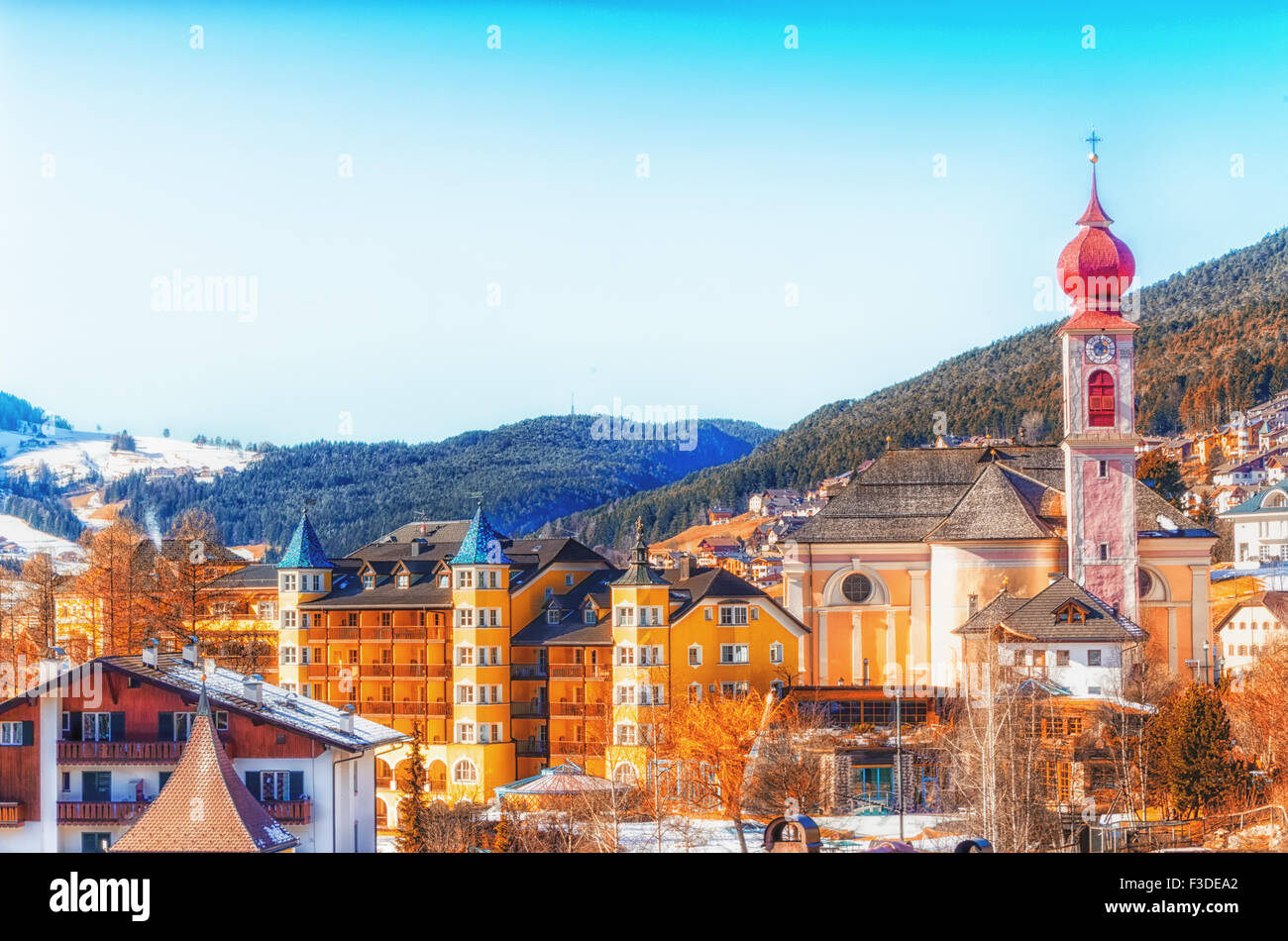 Panorama of Ortisei, Italian village in Dolomites Alps in Italy: homes