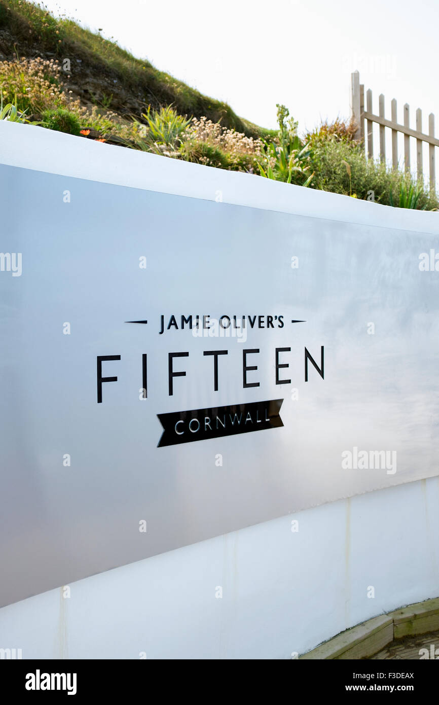 Sign at the entrance to Jamie Oliver's Fifteen restaurant in Watergate Bay, Cornwall. Stock Photo