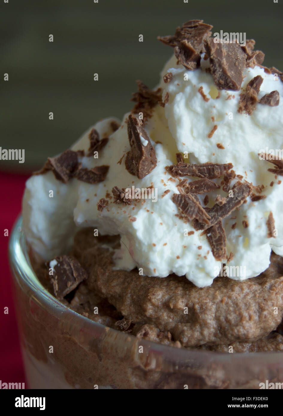 chocolate mousse with whipped cream and chocolate topping Stock Photo