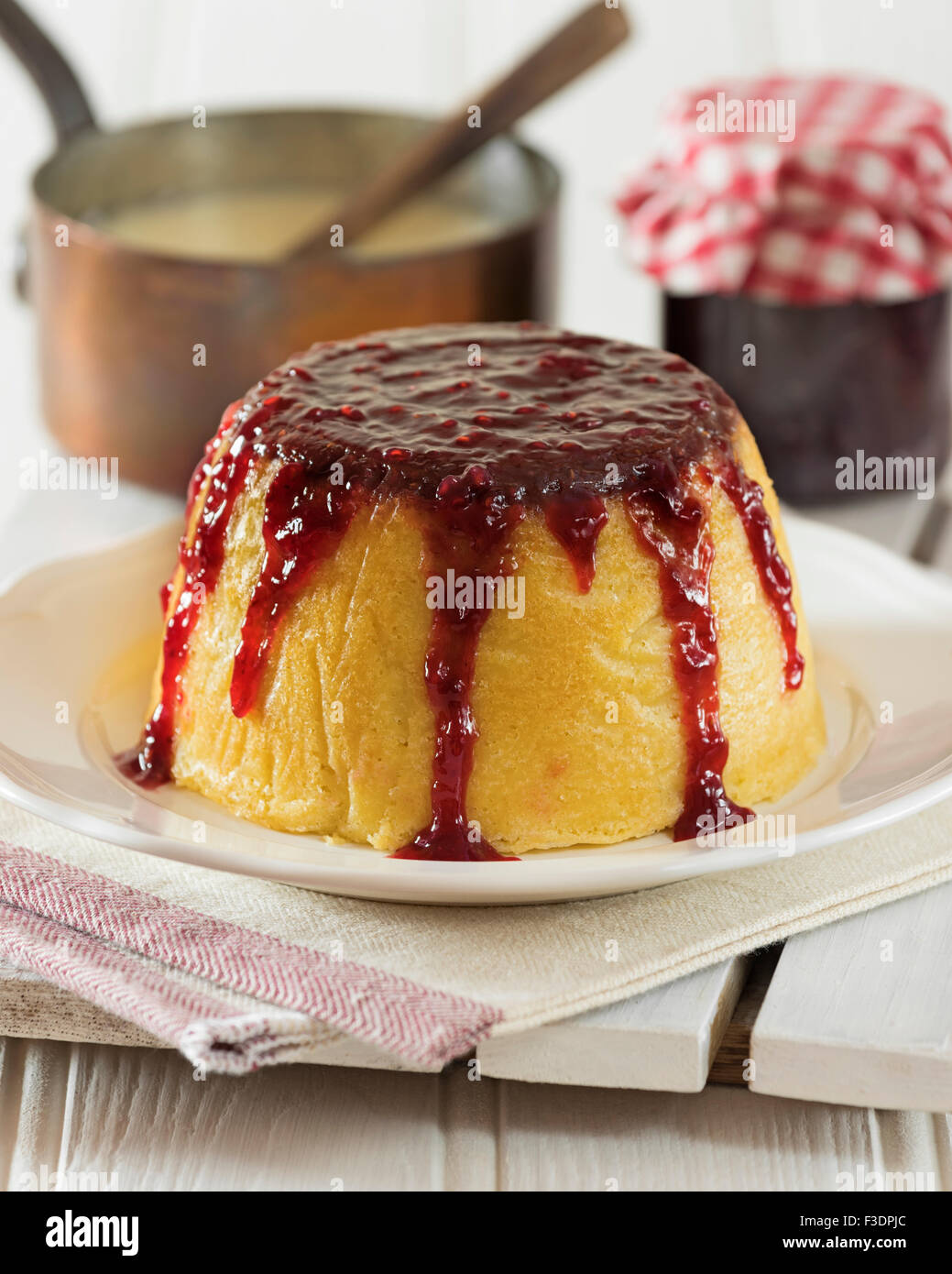 Steamed jam pudding. Traditional dessert UK Stock Photo Alamy