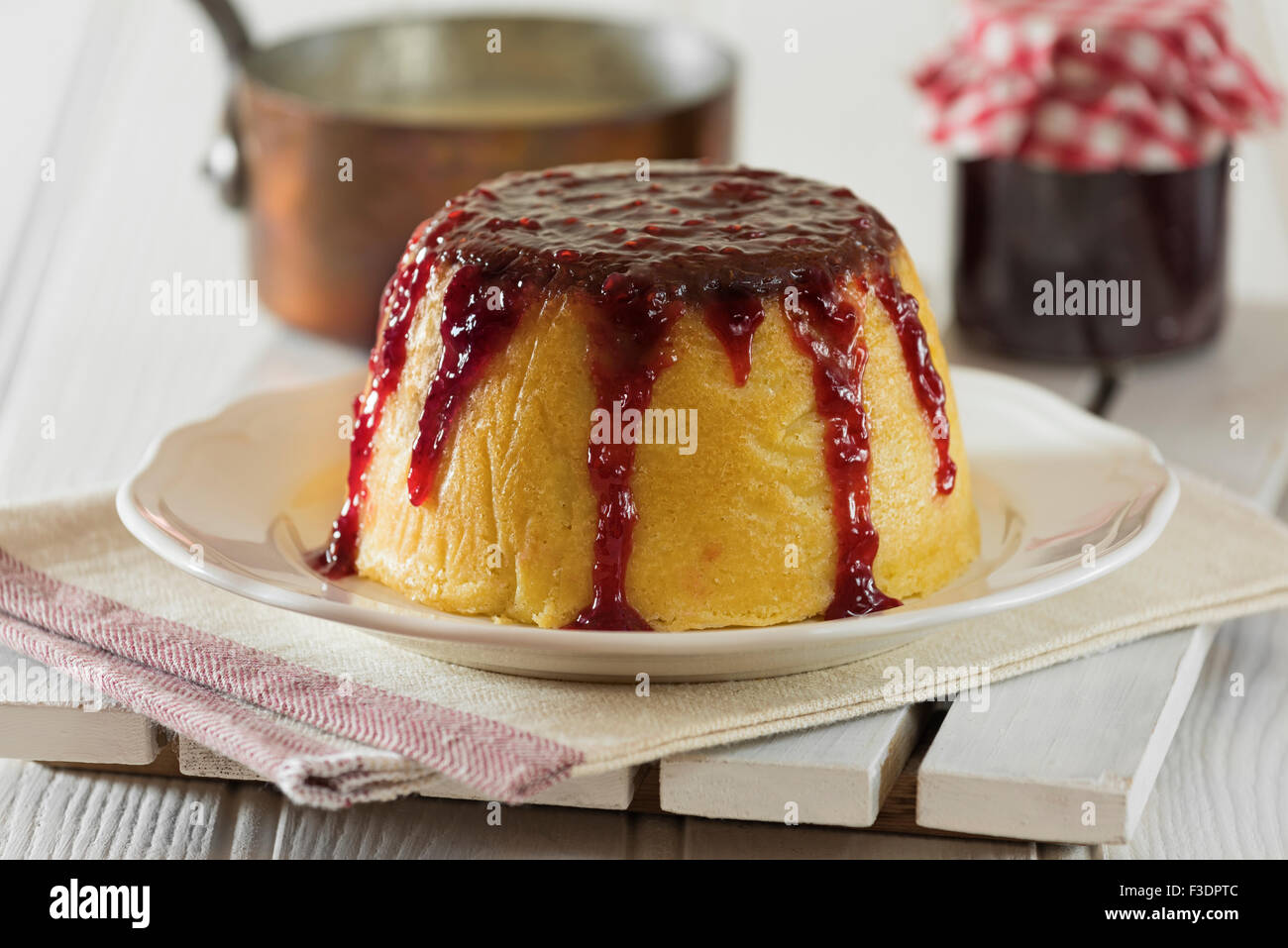 Steamed jam pudding. Traditional dessert UK Stock Photo Alamy