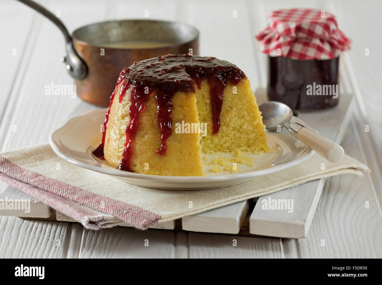 Steamed jam pudding. Traditional dessert UK Stock Photo Alamy