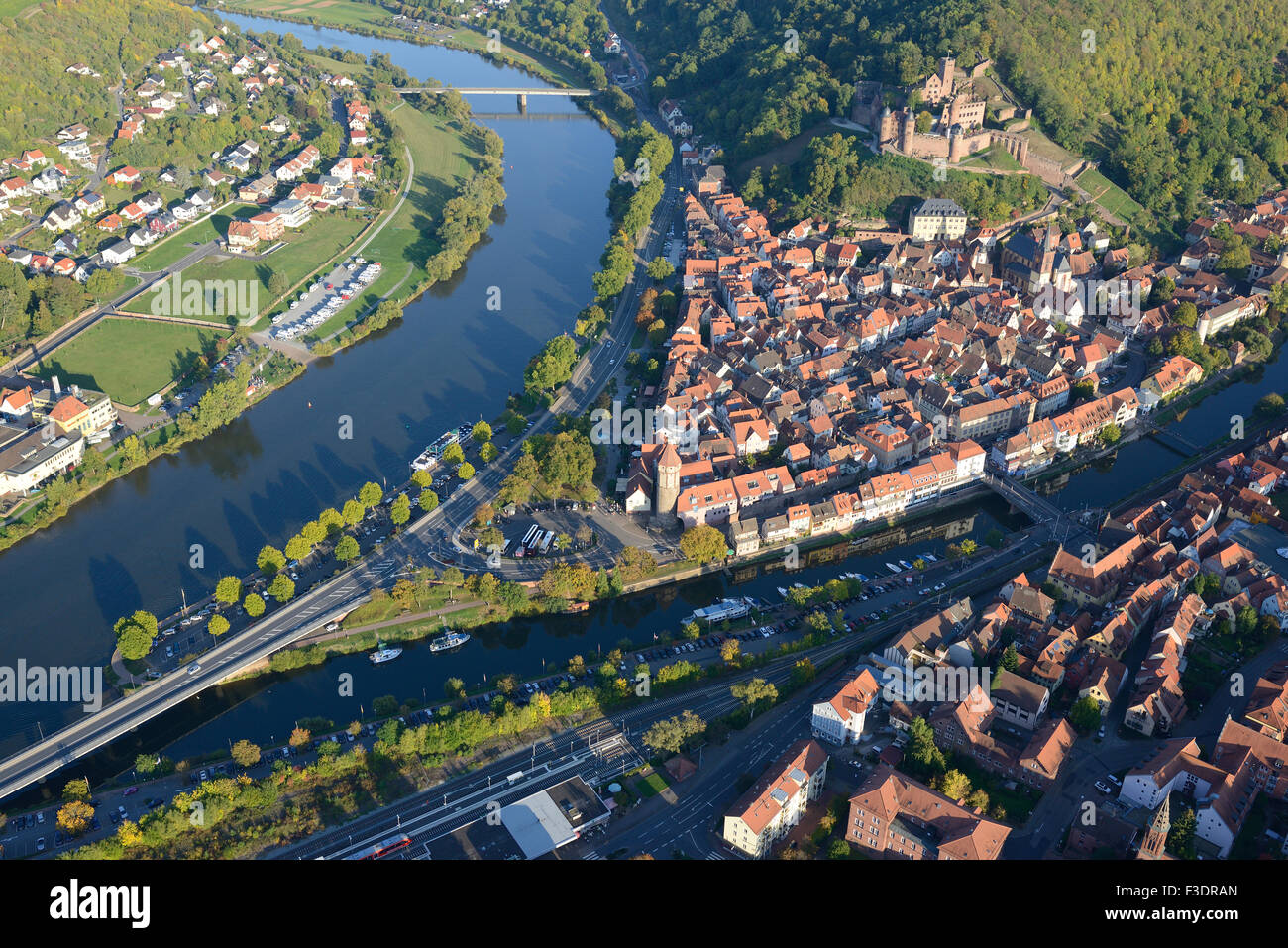 AERIAL VIEW. Medieval town at the confluence of the Main (on the left) and Tauber Rivers. Wertheim am Main, Baden-Württemberg, Germany. Stock Photo