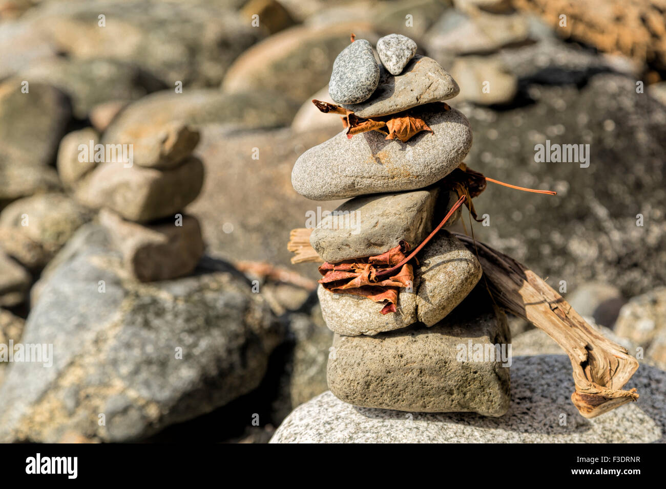 Close-up of stone cairns on the beach of Stanley Park on the Pacific Ocean, Vancouver, British Columbia, Canada, North America. Stock Photo