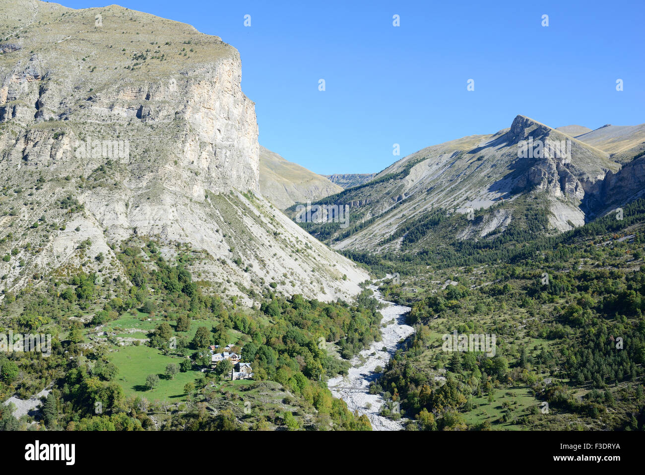 AERIAL VIEW. Remote abandoned hamlet with no access road in a dramatic landscape. Aurent, Alpes de Haute-Provence, France. Stock Photo
