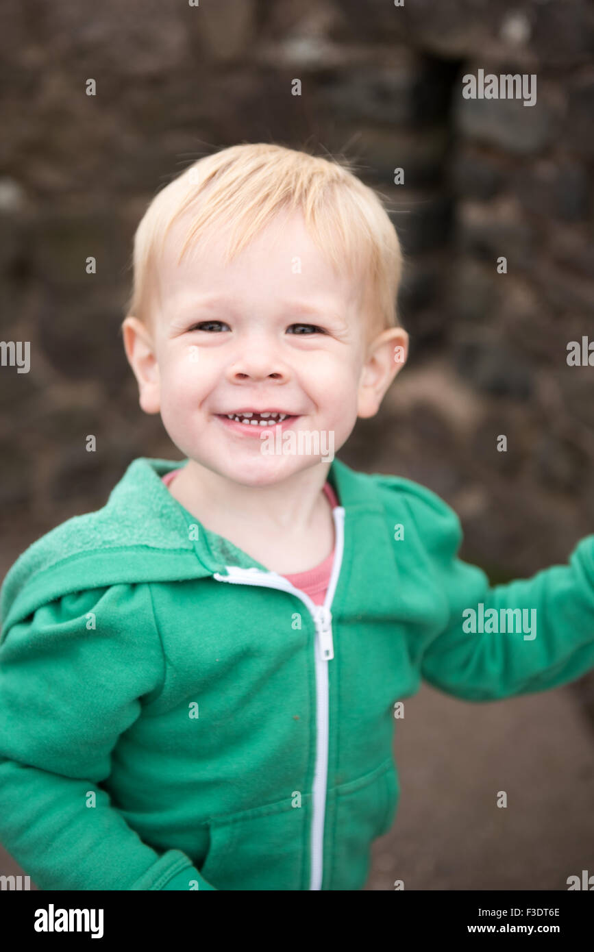 Cheeky boy smiling at camera Stock Photo