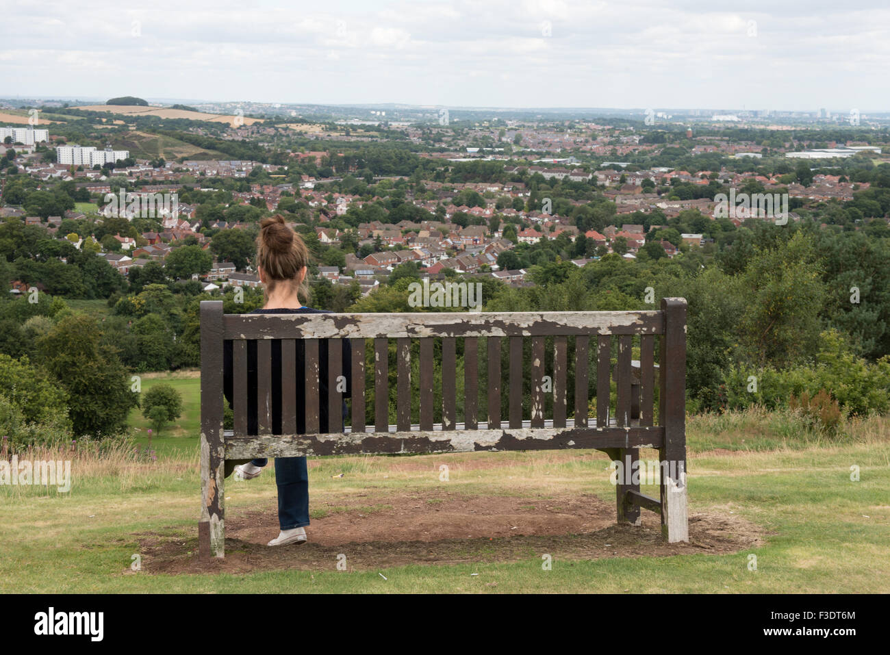 Lady Looking at the City from Afar Stock Photo