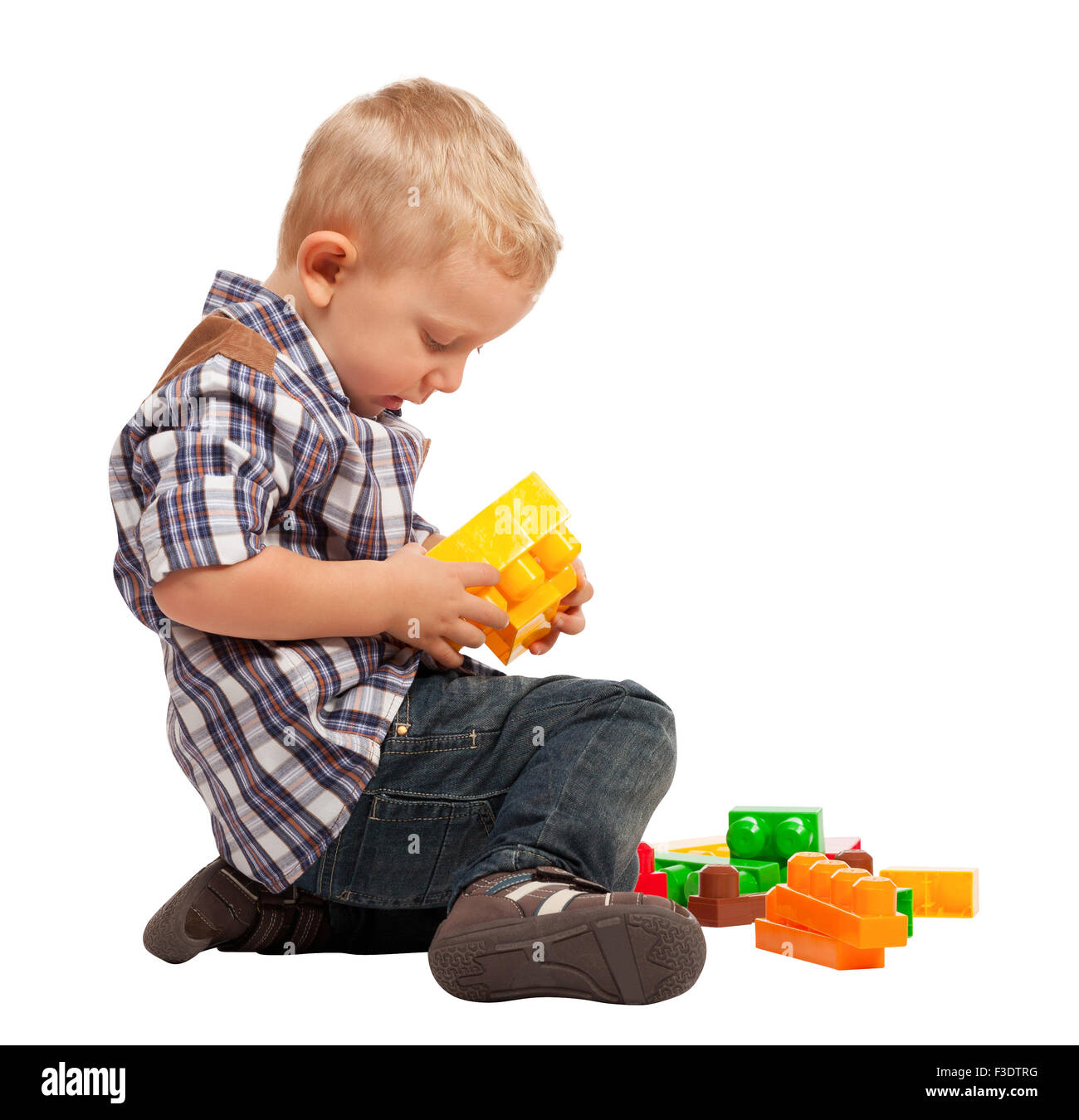 child play with construction toy blocks isolated on white Stock Photo