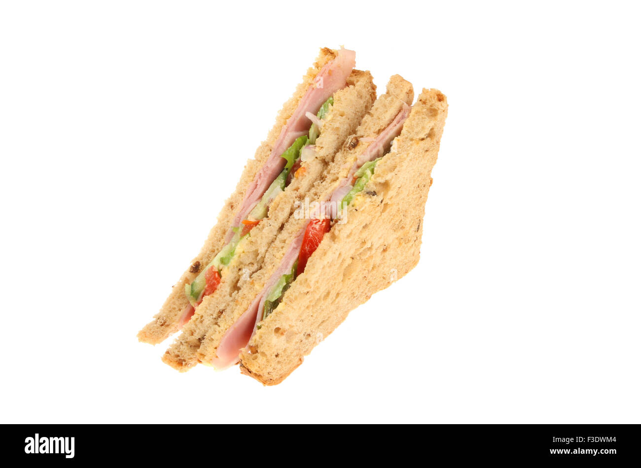 Ham salad sandwich made with multi grain bread isolated against white Stock Photo